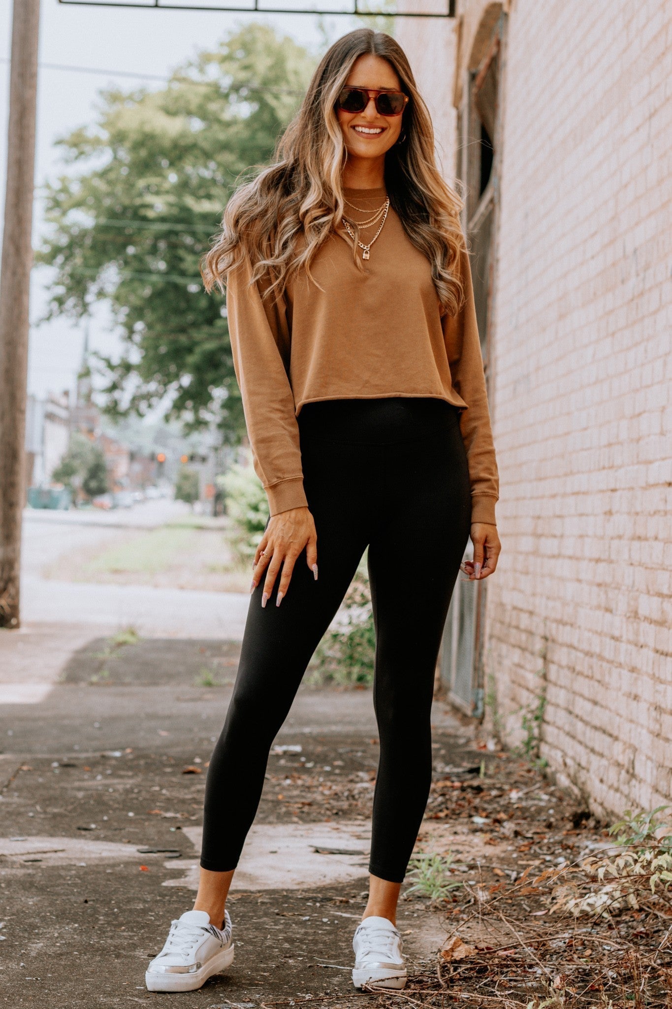 The Most Helpful Guide on How to Wear Black Leggings With Brown